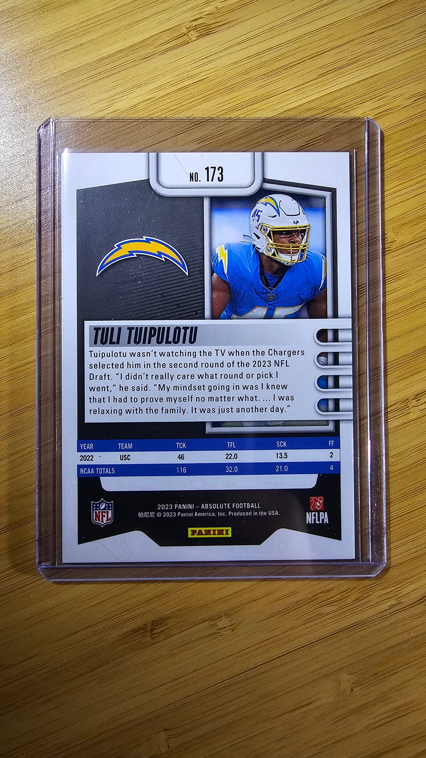 2023 Panini Absolute football Tuli Tuipulotu - RC Orange Mosiac 104/299 - Los Angeles Chargers