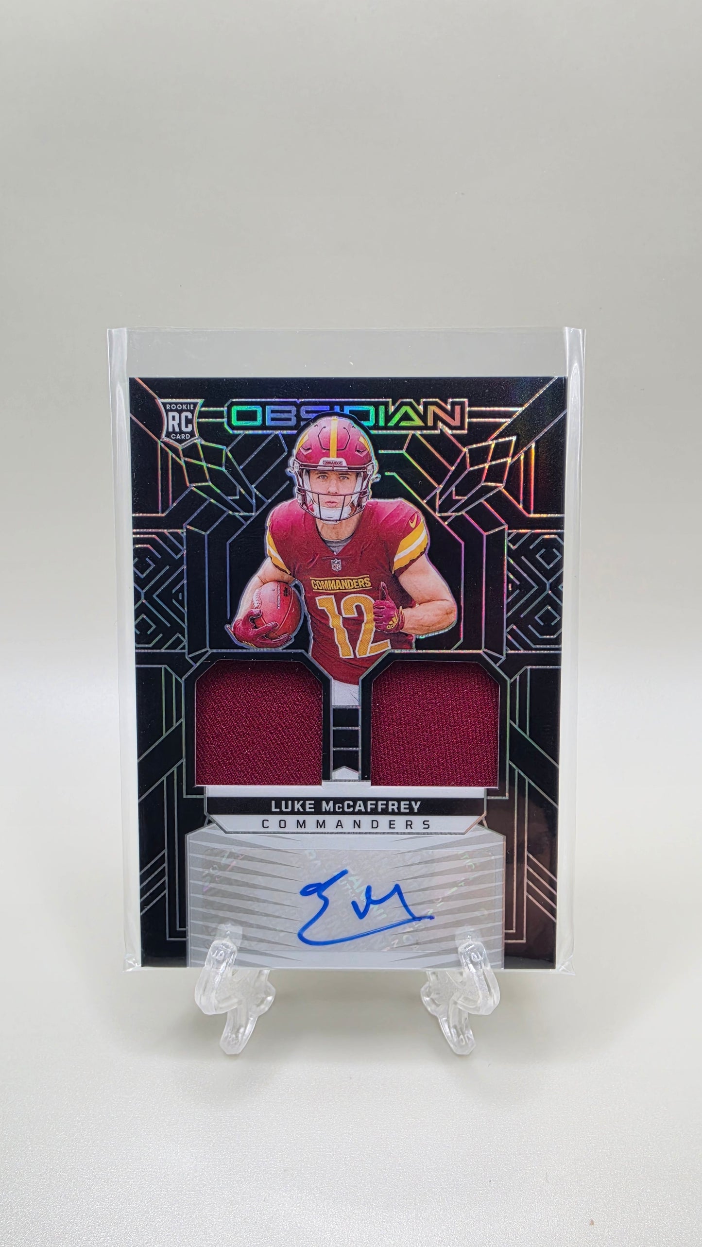 2024 Panini Obsidian Luke McCaffrey Rookie Patch Auto #/299 Card #RMI-LMC