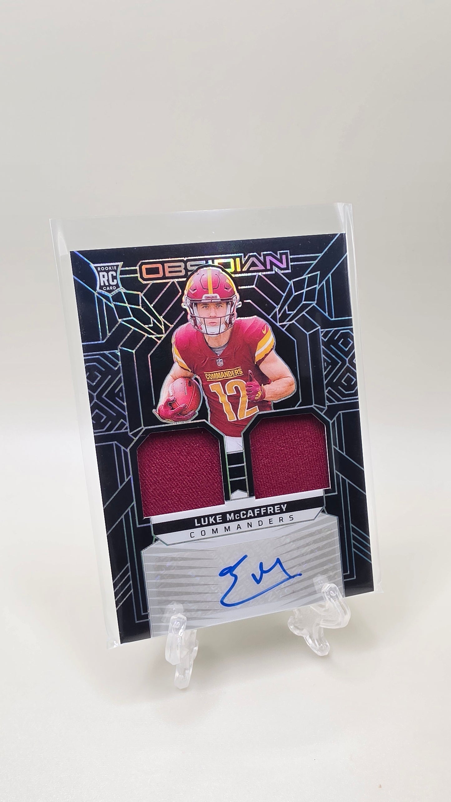 2024 Panini Obsidian Luke McCaffrey Rookie Patch Auto #/299 Card #RMI-LMC