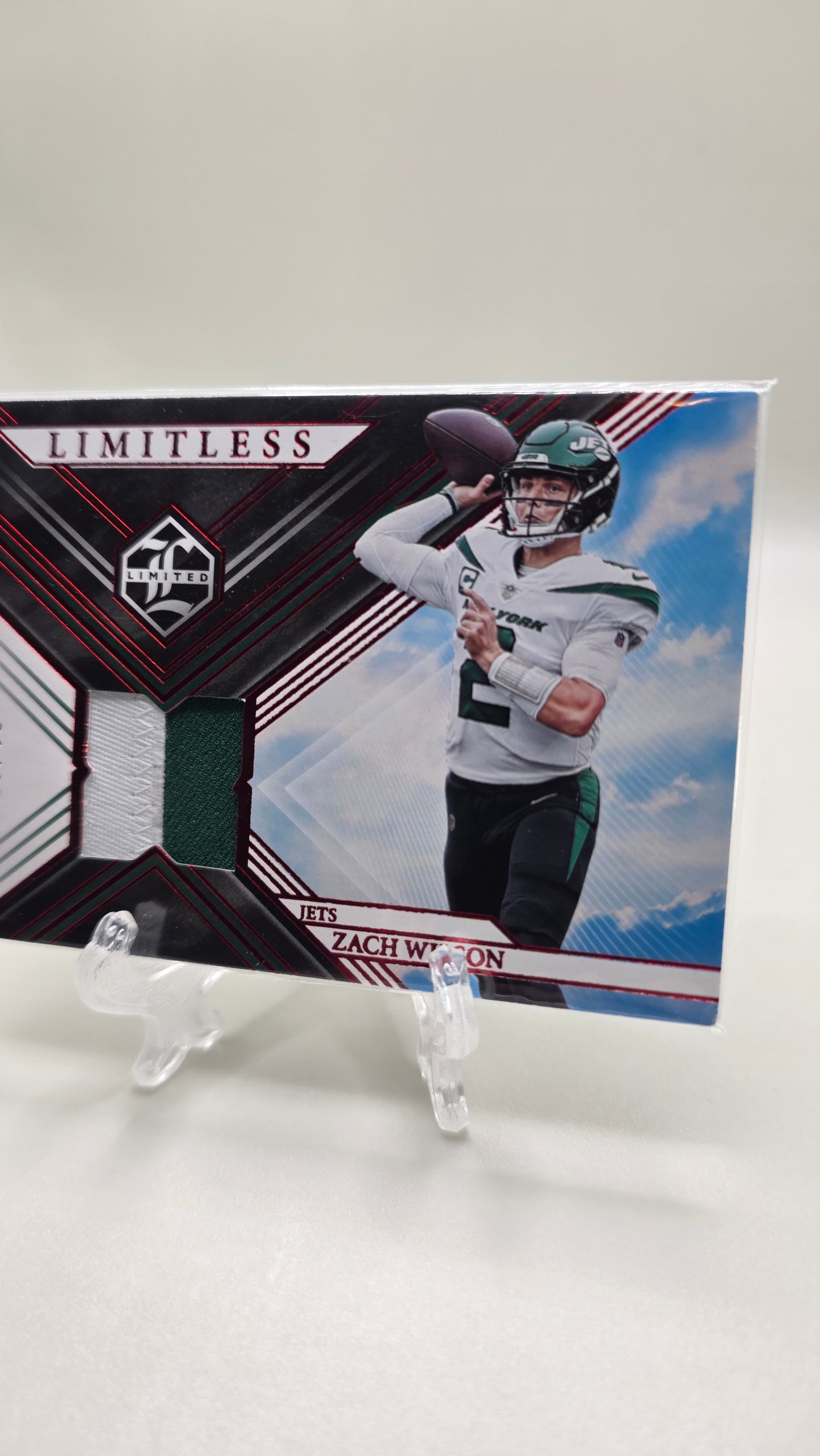 2022 Panini Limited Zach Wilson Limitless Red # /25 Card # LM-ZWI